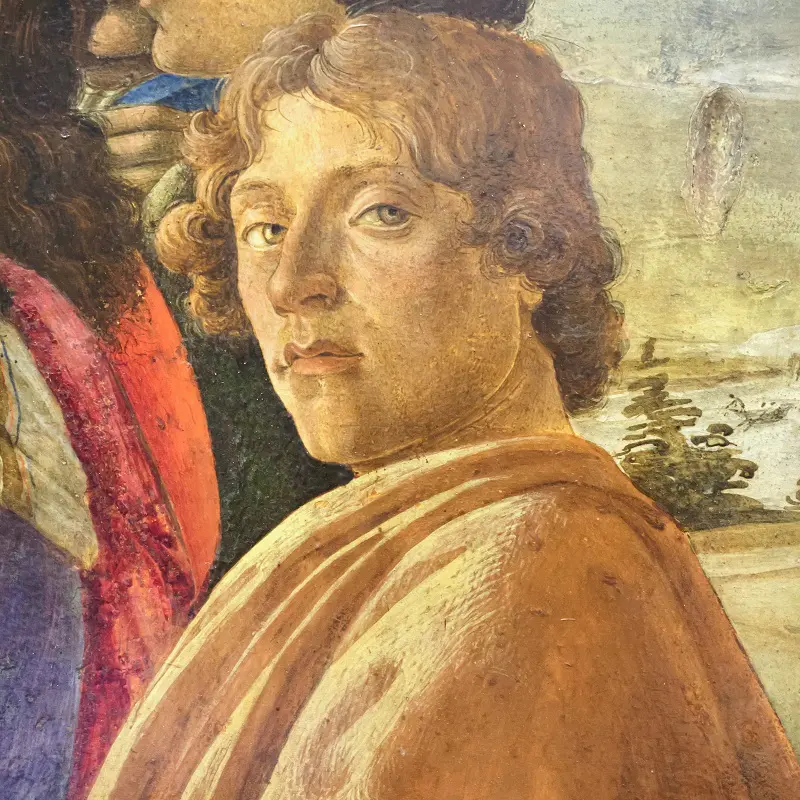 Probably self-portrait of Italian Renaissance painter Sandro Botticelli. Detail of the painting ‘Adoration of the Magi’ by Sandro Botticelli dated from circa 1475 on display in the Uffizi Gallery (Galleria degli Uffizi) in Florence, Tuscany, Italy.